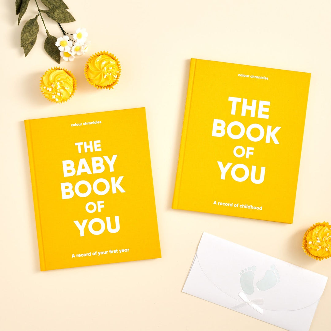 Baby memory book set shown in yellow