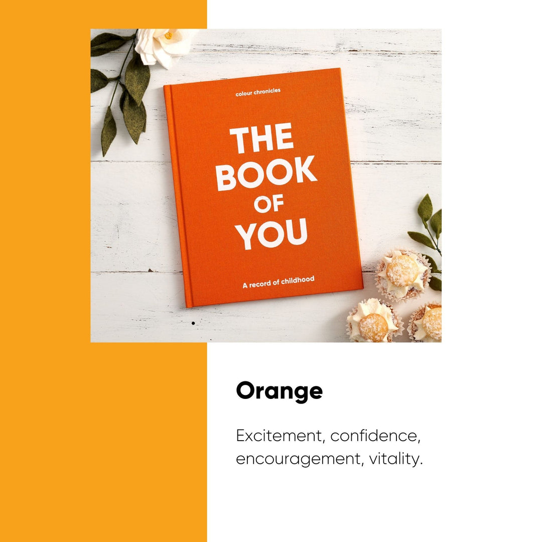 The Book of You childhood record book shown in orange with meanings of the colour
