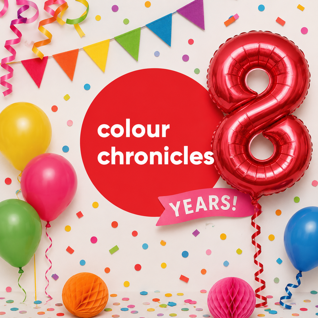 Colour Chronicles logo with a number 8 balloon and party decorations